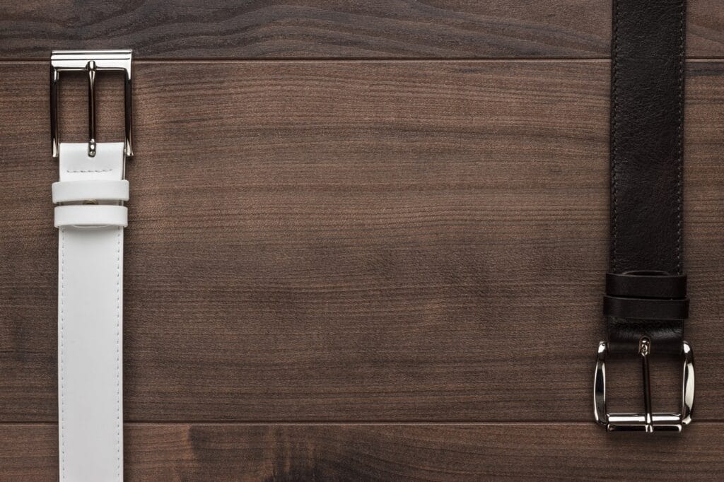 brown and white leather belts