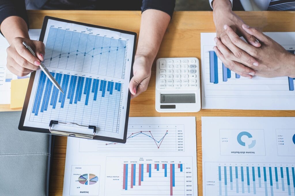 Business colleague team working and analyzing with new project of accounting finance